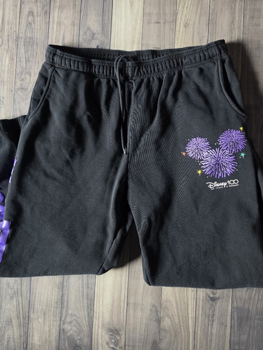 Disney Black Sweat Pants with Purple Fireworks Logo